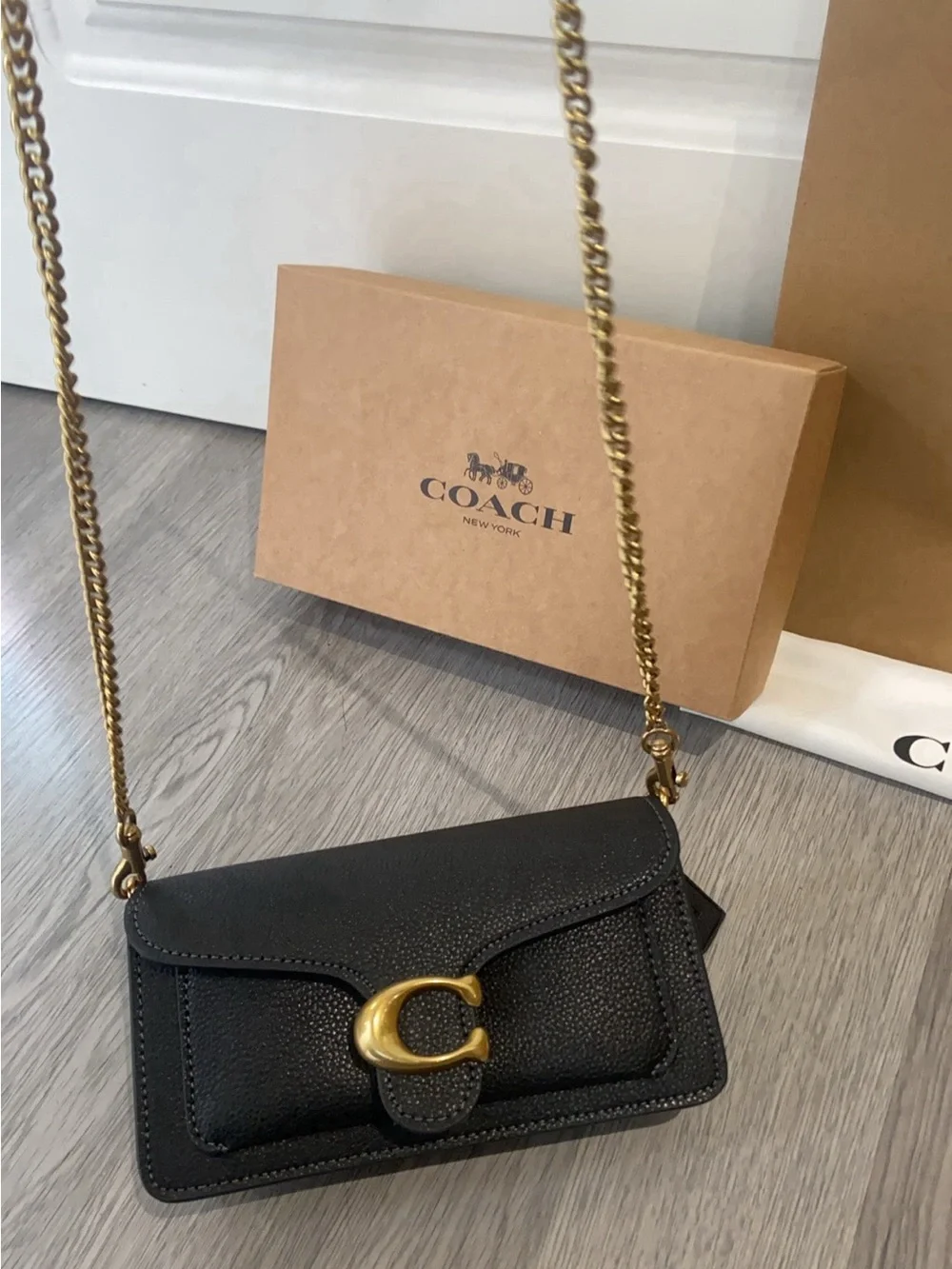 Coach Black Leather Crossbody with Gold 'C' Hardware and Chain Strap